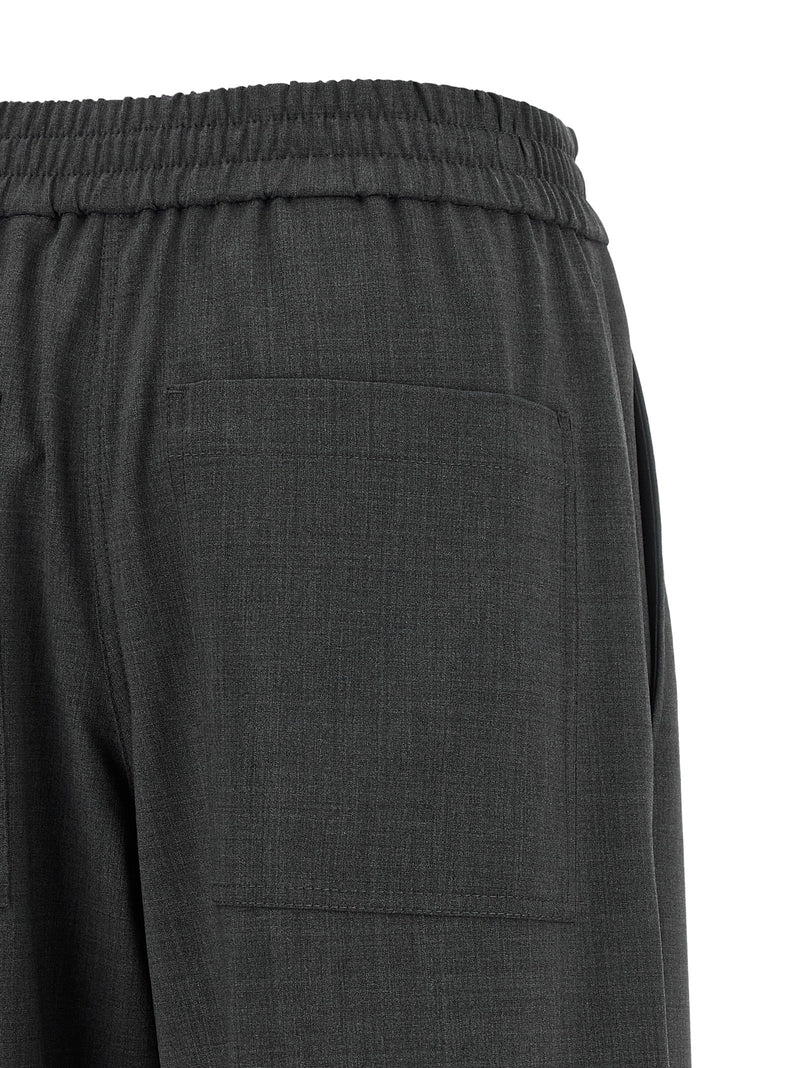 Brunello Cucinelli Pantalon évasé gris en laine vierge