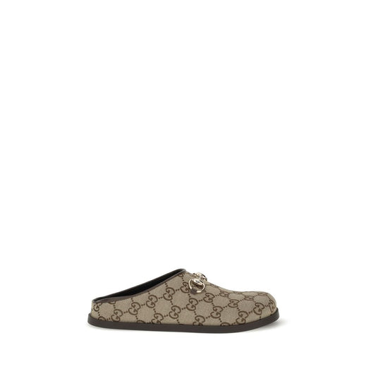 Mules en caoutchouc beige Gucci