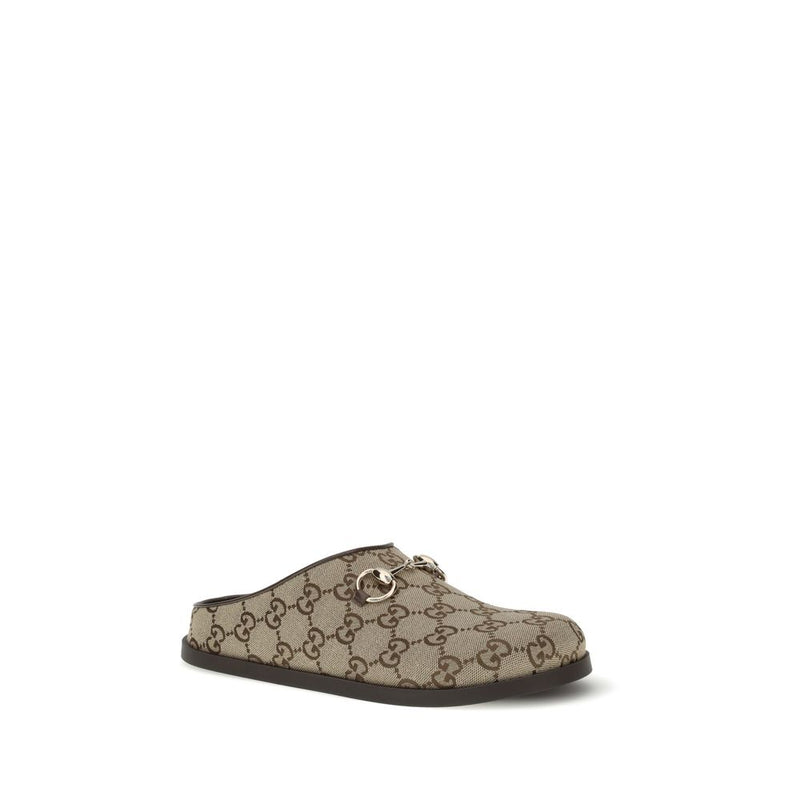 Mules en caoutchouc beige Gucci