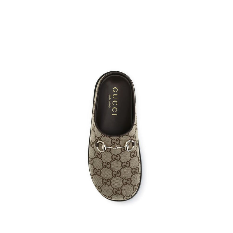 Mules en caoutchouc beige Gucci