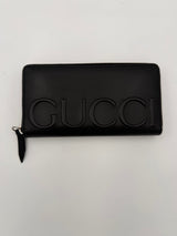 Portefeuille zippé Gucci GUCCI noir avec logo estampé sur le devant
