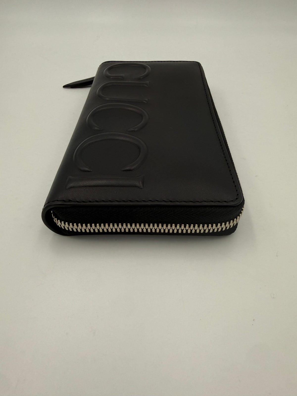 Portefeuille zippé Gucci GUCCI noir avec logo estampé sur le devant