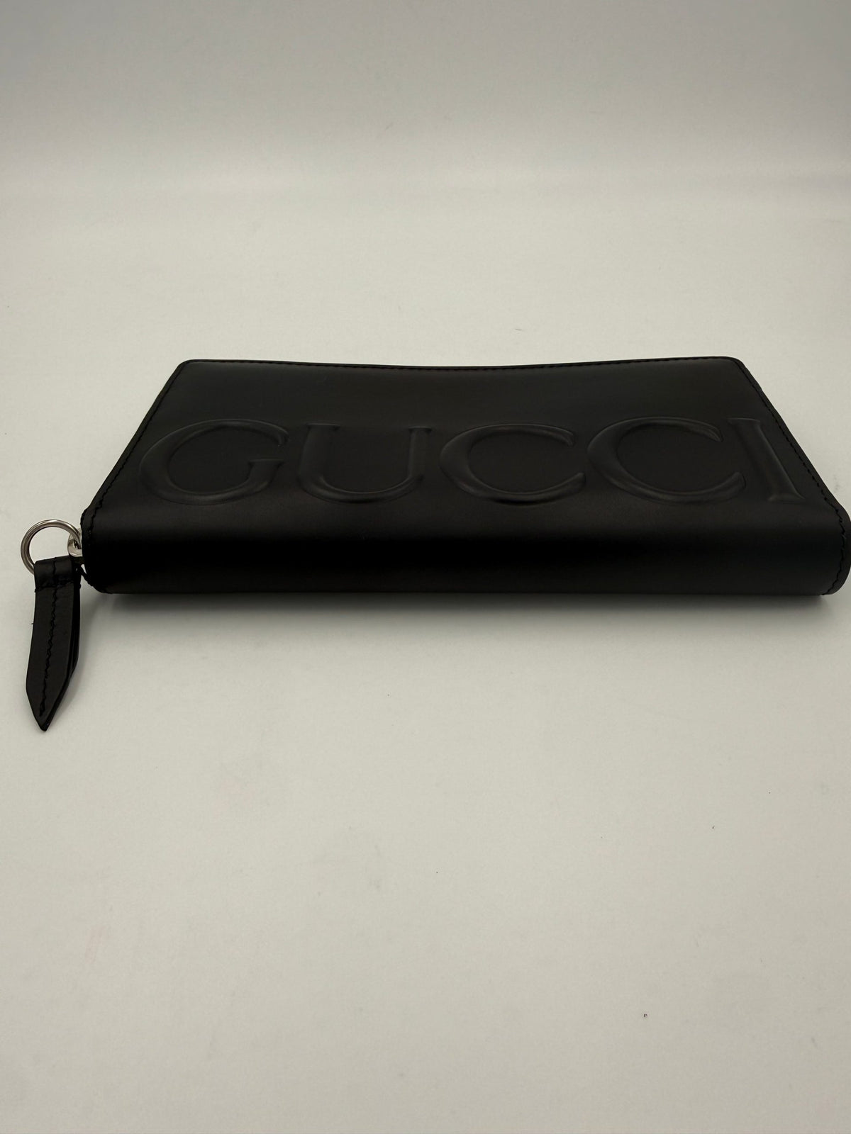 Portefeuille zippé Gucci GUCCI noir avec logo estampé sur le devant