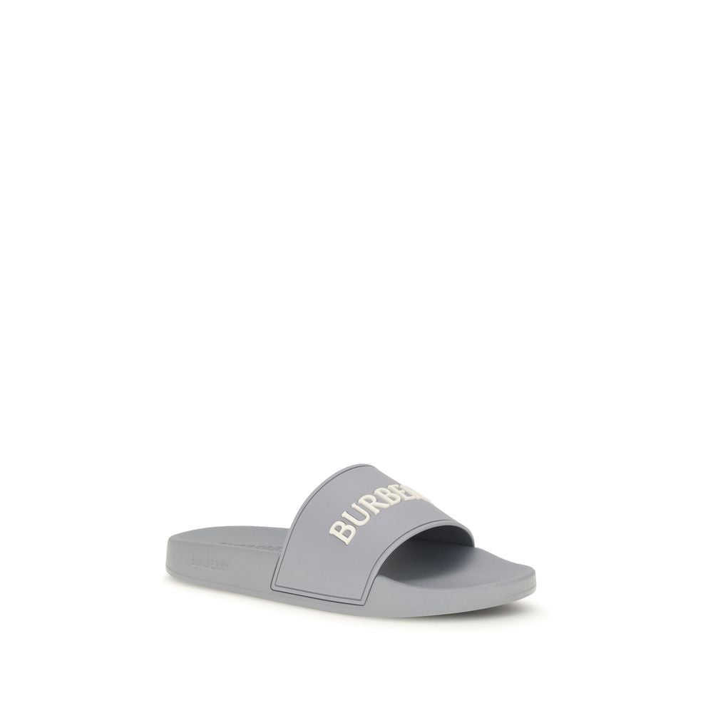 Tongs en caoutchouc gris Burberry