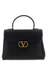 Sac à main Valentino Garavani en cuir de veau noir