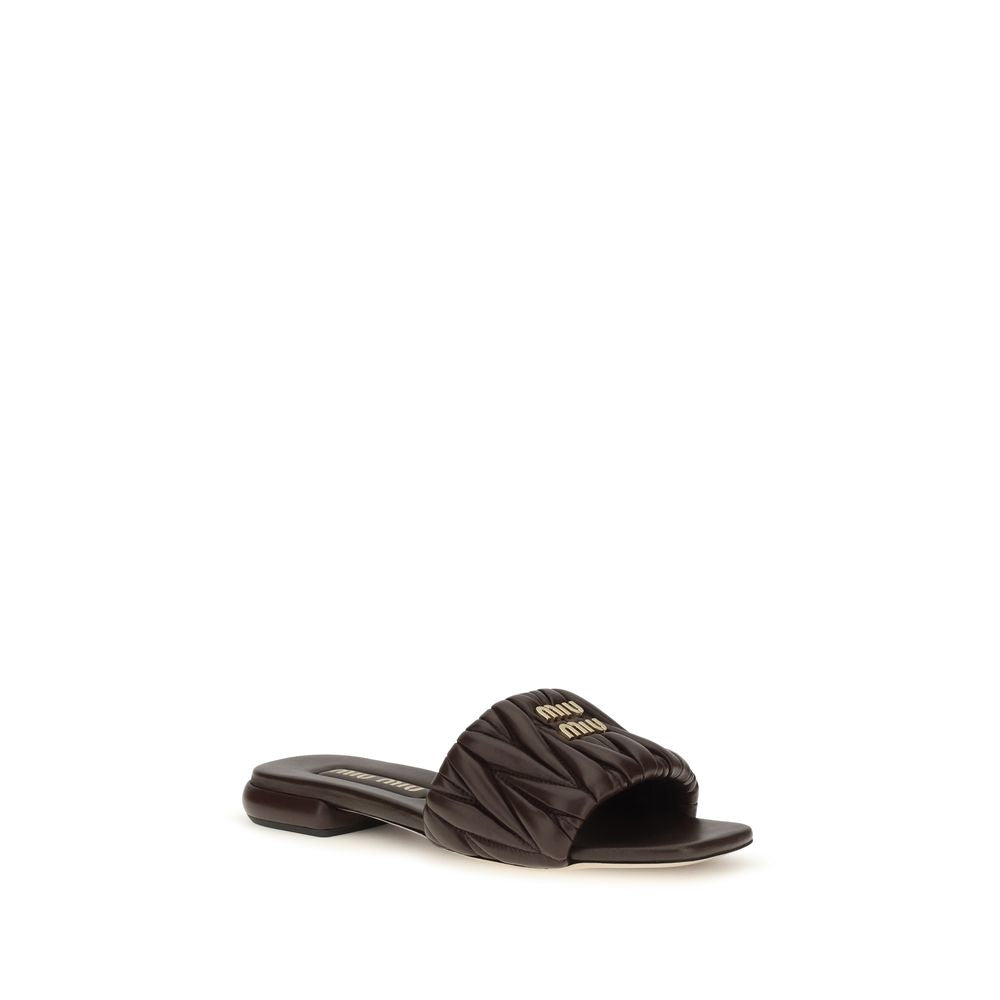 Sandales plates Miu Miu en cuir de veau marron Bos Taurus