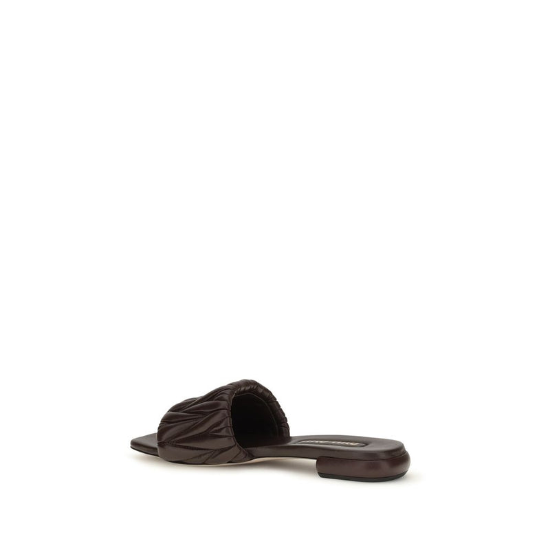 Sandales plates Miu Miu en cuir de veau marron Bos Taurus