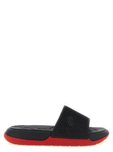 Mules Christian Louboutin noires en polyéthylène