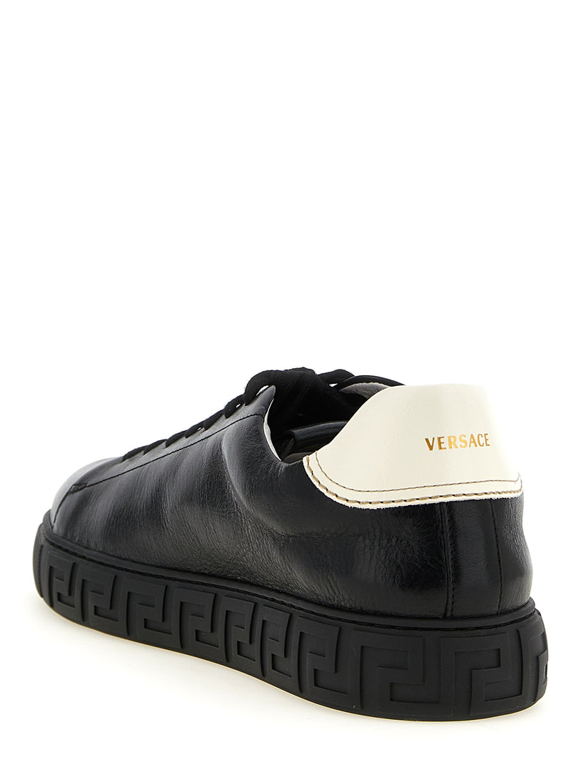 Baskets basses bicolores en cuir de veau Versace