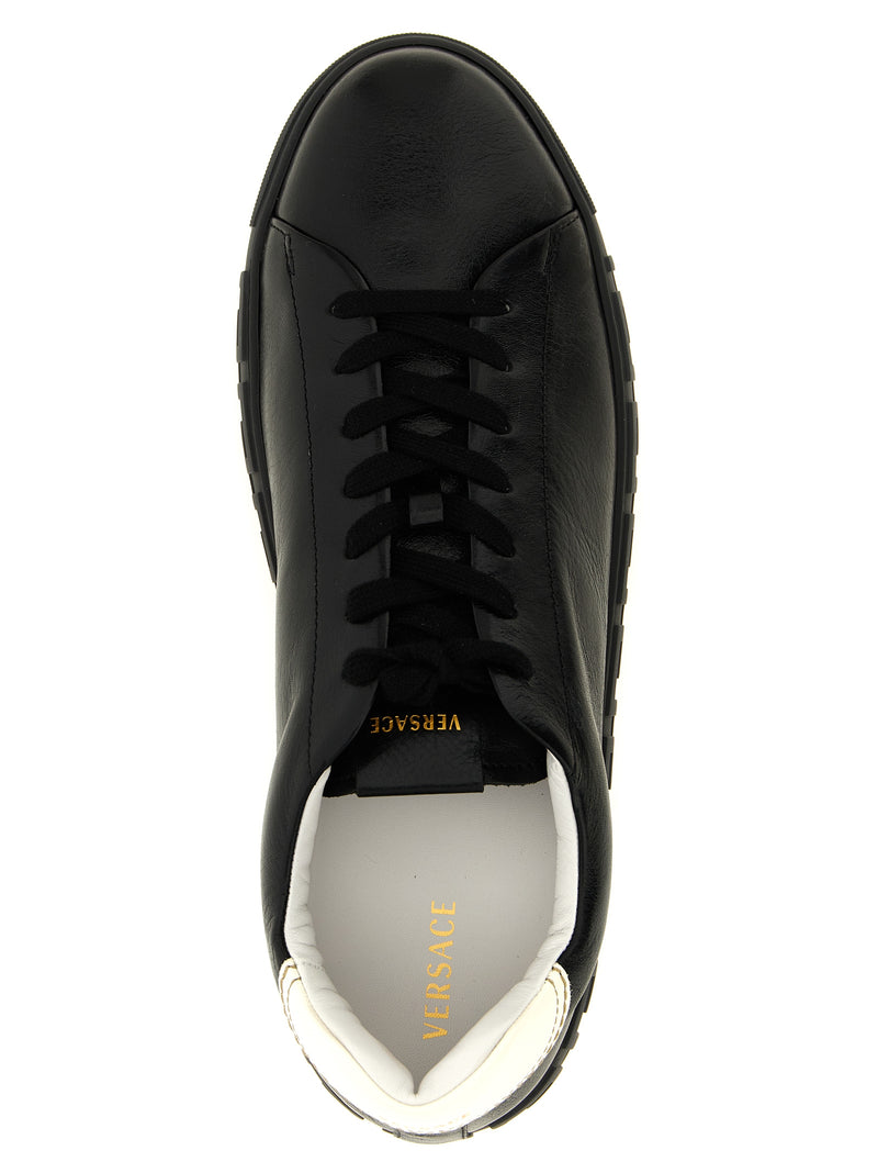 Baskets basses bicolores en cuir de veau Versace