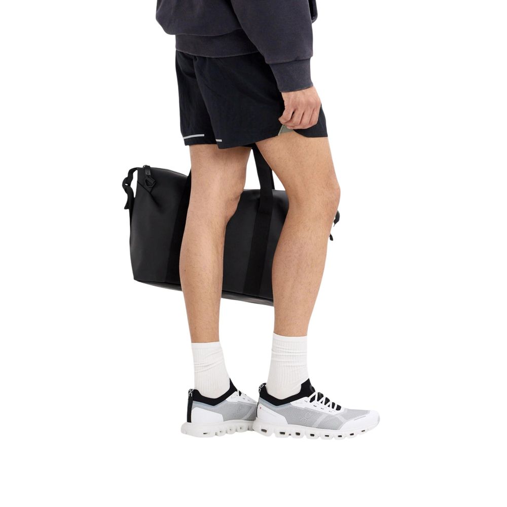 Baskets de sport synthétiques noires et blanches On Running