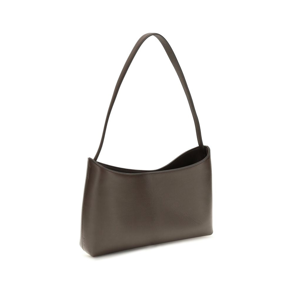 Sac bandoulière Bos Taurus en cuir de veau marron de The Row