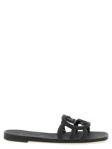Mules en caoutchouc noires Gucci