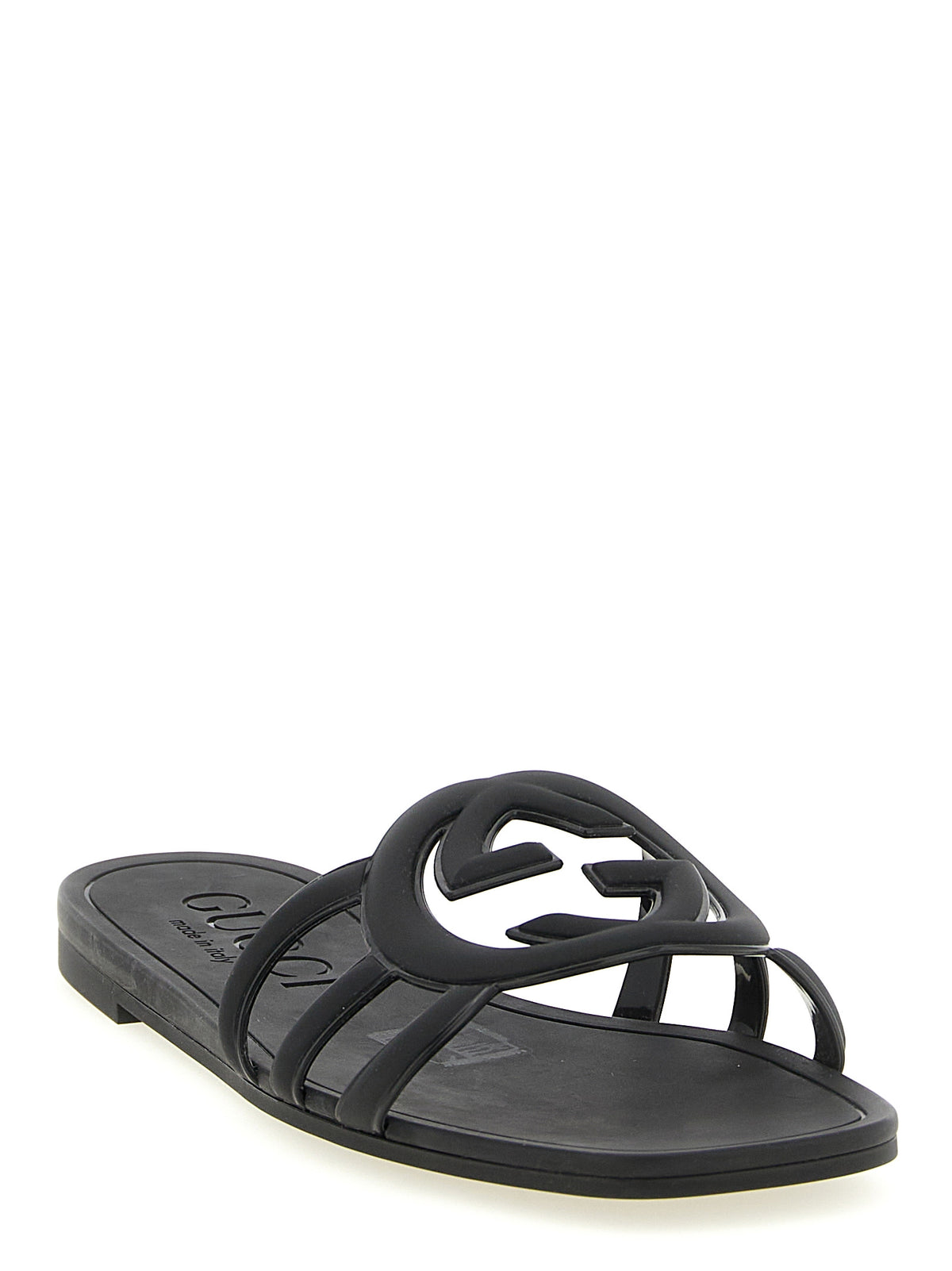 Mules en caoutchouc noires Gucci