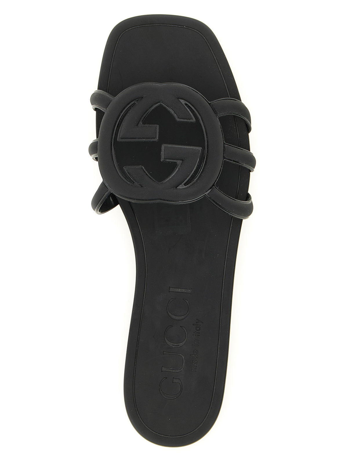 Mules en caoutchouc noires Gucci