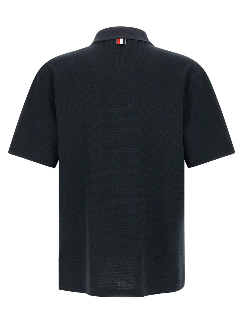 Polo bleu en coton Thom Browne