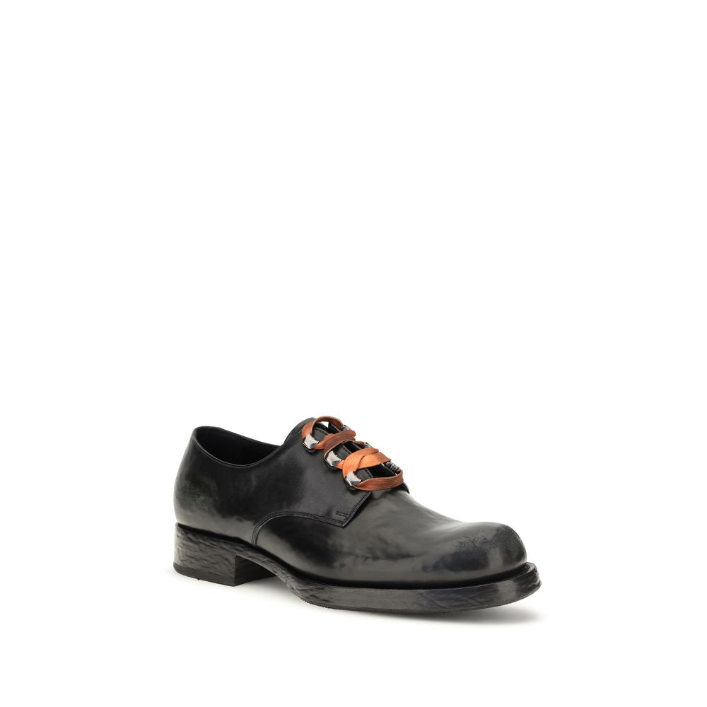 Prada Chaussures basses en cuir de veau noir Bos Taurus