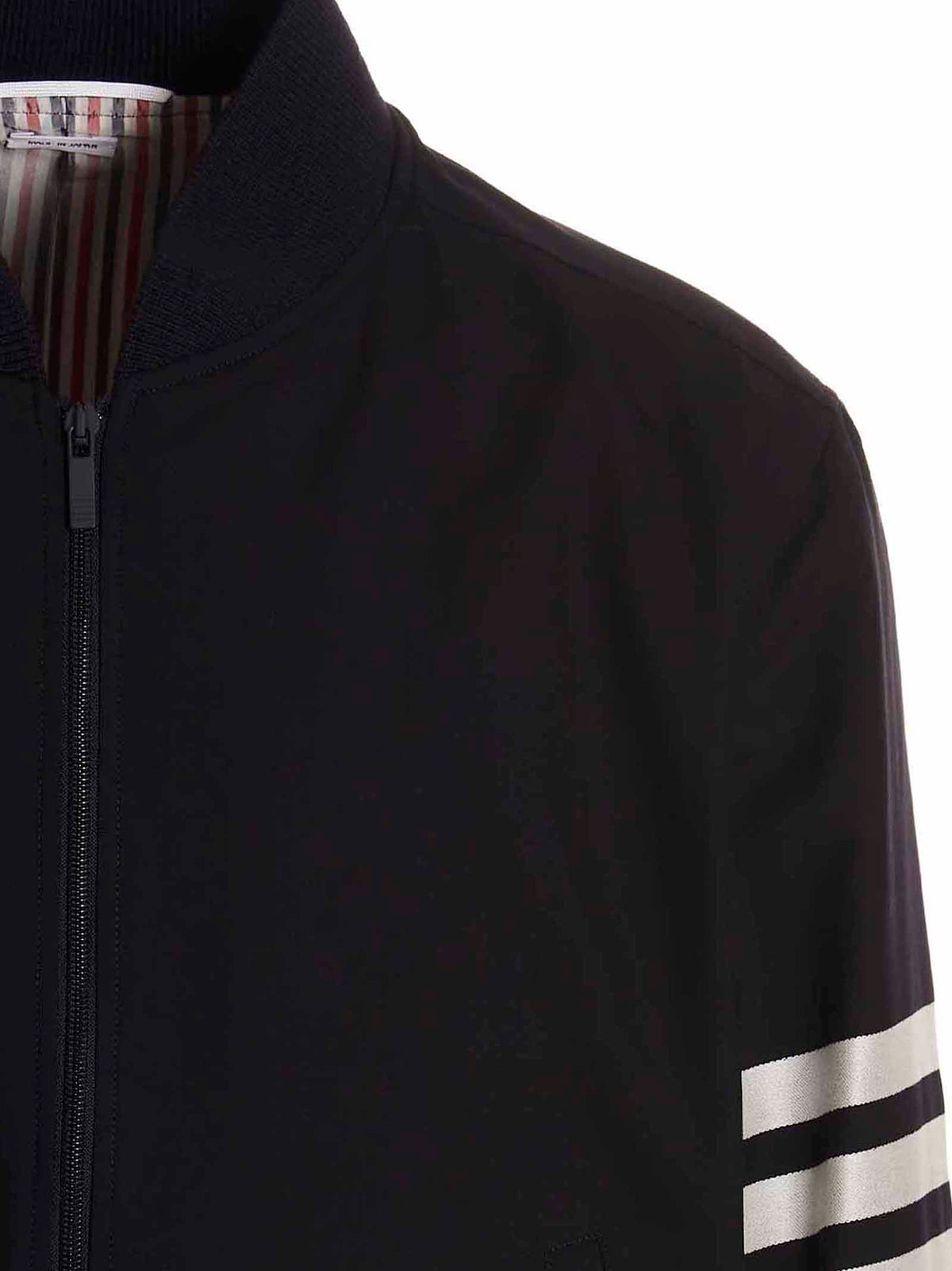 Bomber en laine bleue Thom Browne