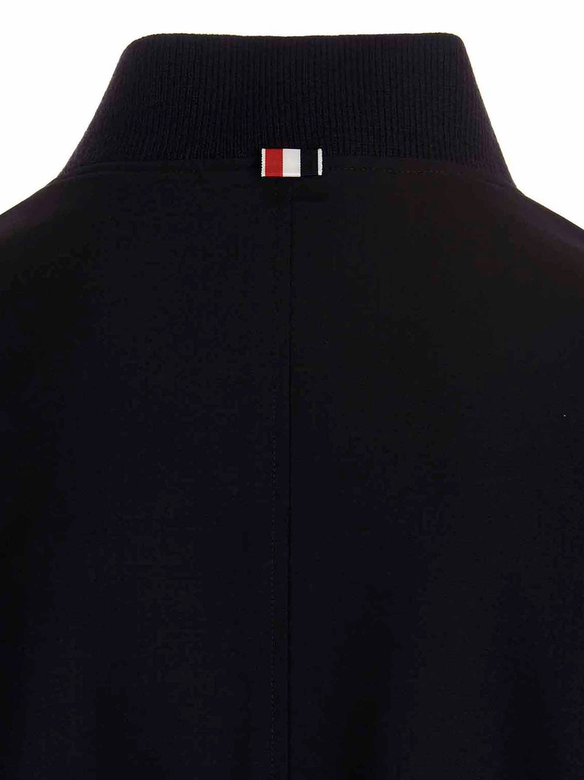 Bomber en laine bleue Thom Browne