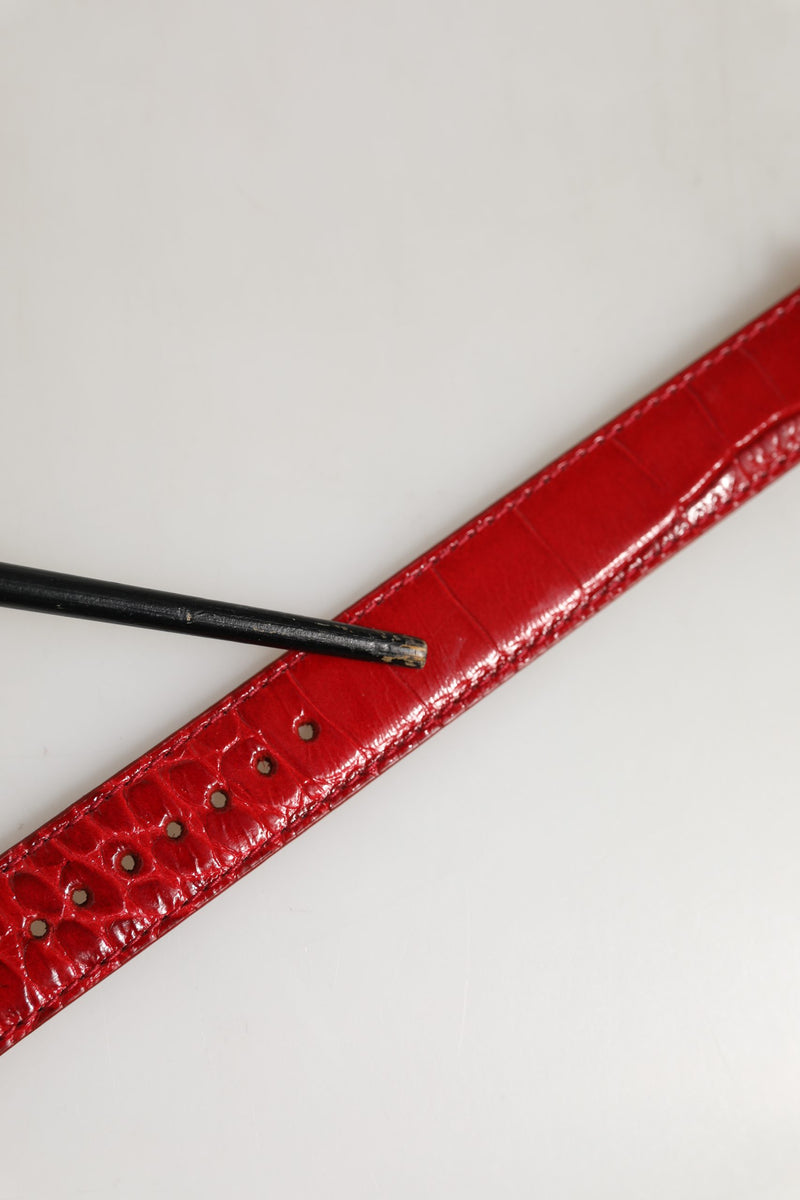 Bracelet Dolce & Gabbana en cuir gaufré rouge avec boucle ardillon dorée