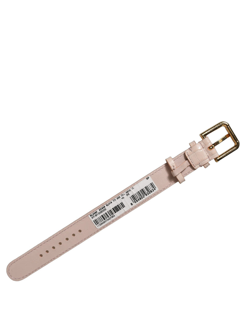 Bracelet ceinture Dolce & Gabbana en cuir rose gaufré à boucle dorée