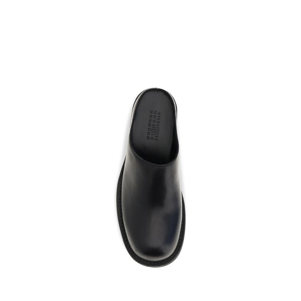 MM6 Mules Bos Taurus en cuir de veau noir