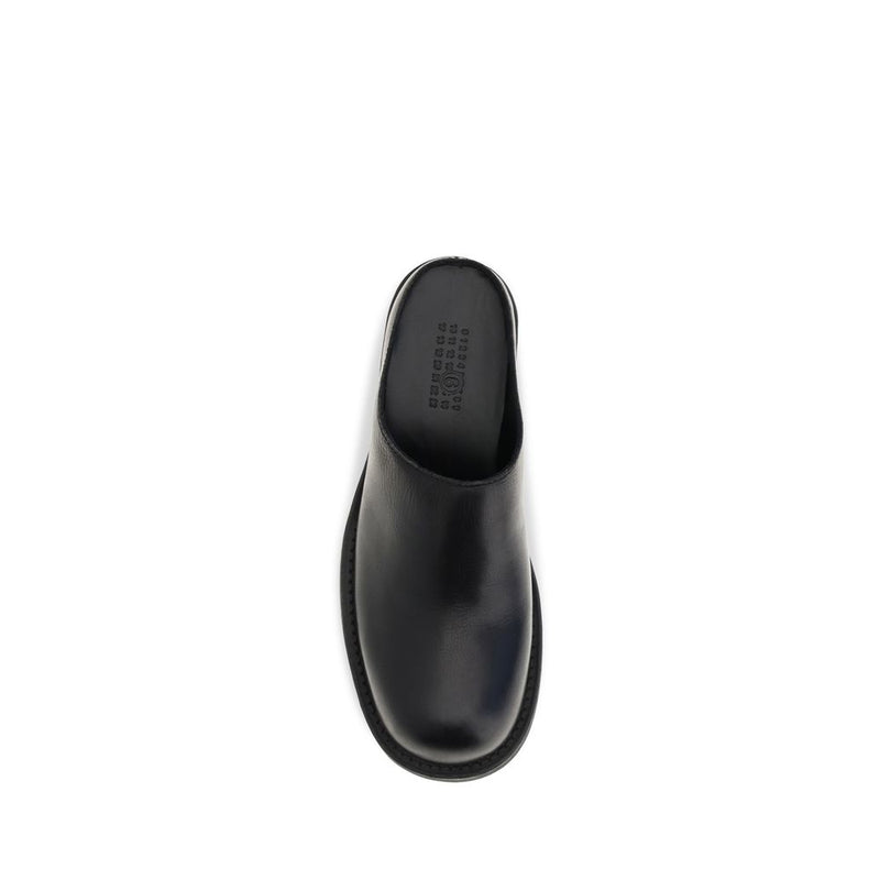MM6 Mules Bos Taurus en cuir de veau noir