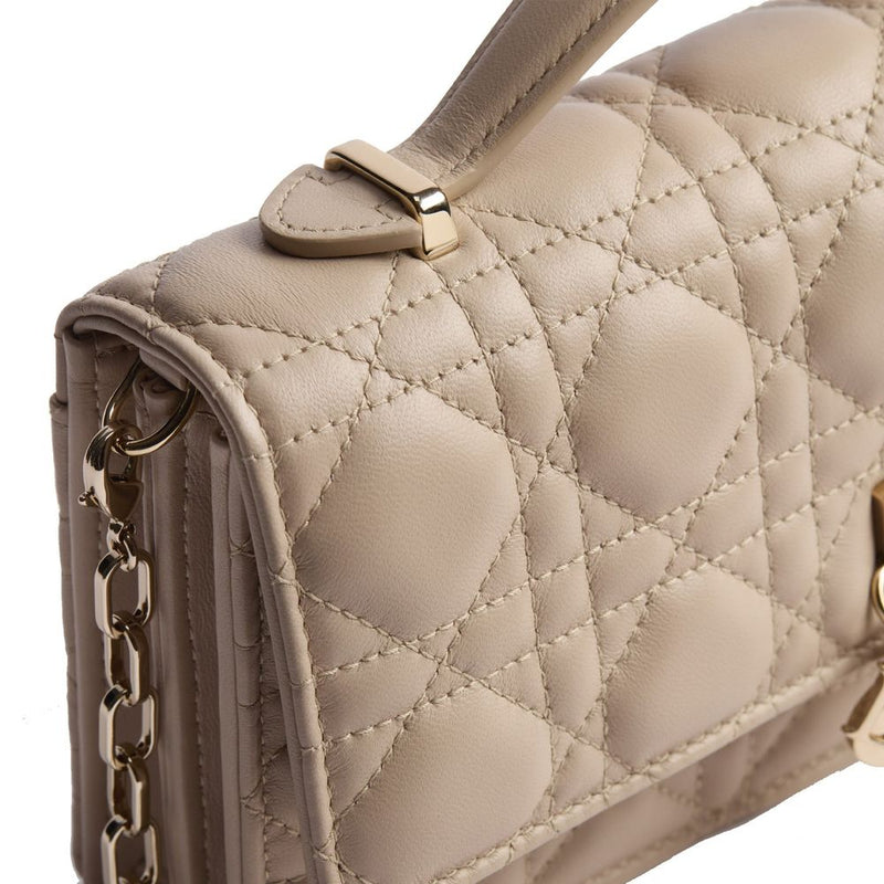 Pochette Dior en cuir beige