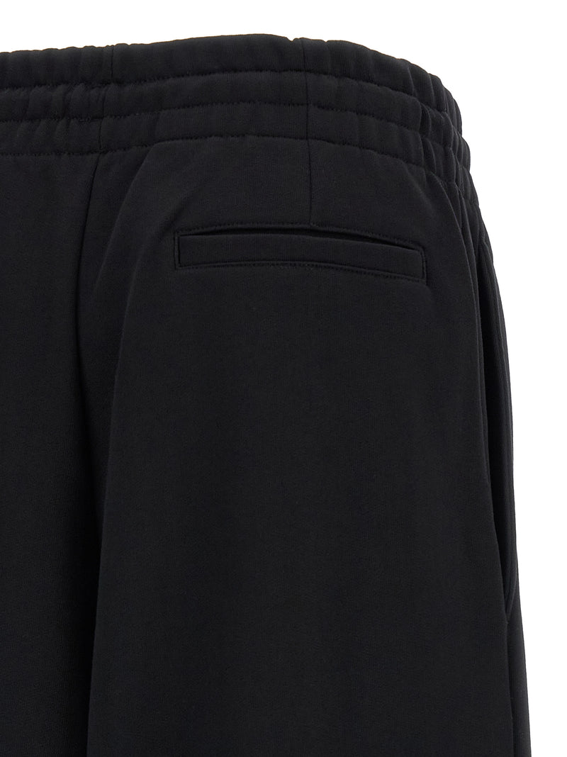 Dries Van Noten Pantalon de sport noir en coton
