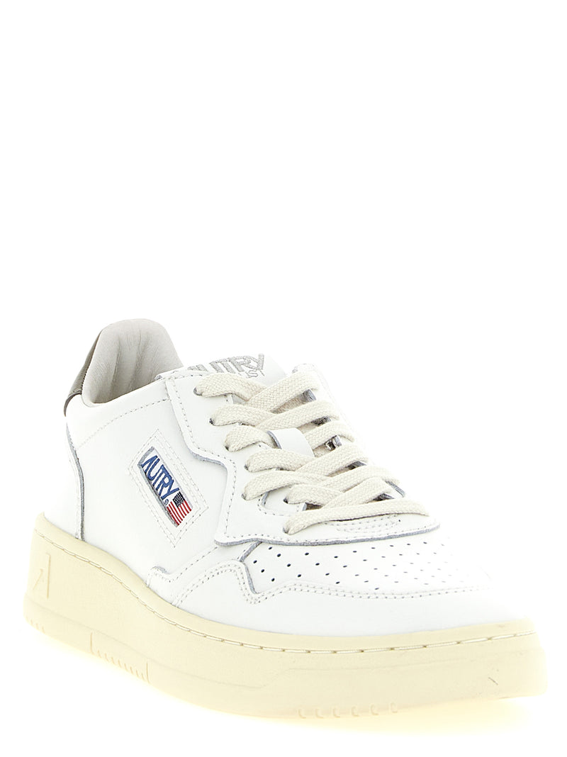 Baskets basses bicolores en cuir de vachette Autry