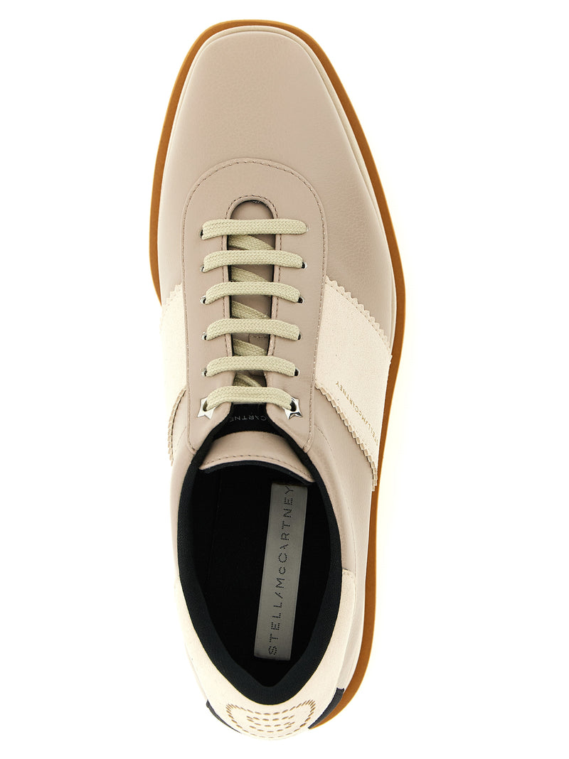 Baskets compensées Stella McCartney en EVA beige