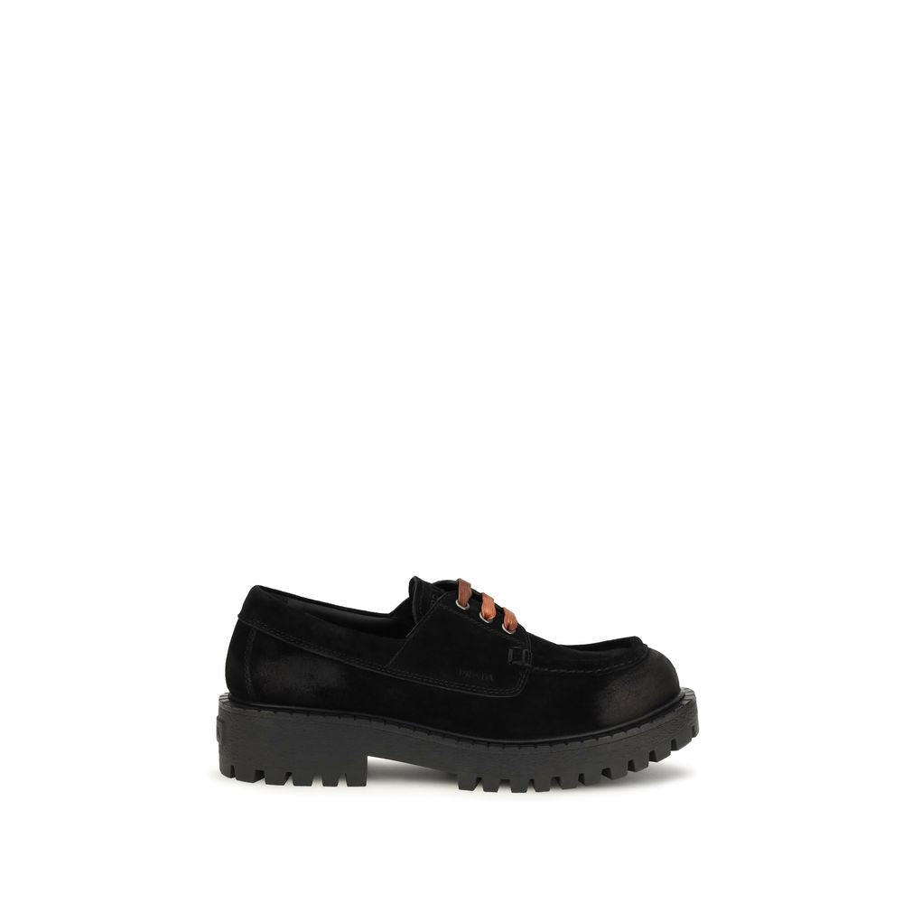 Mocassins à enfiler Prada en cuir suédé noir