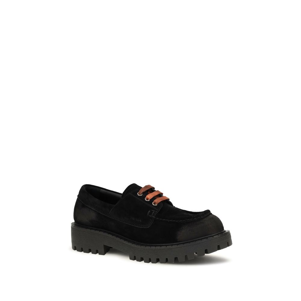 Mocassins à enfiler Prada en cuir suédé noir