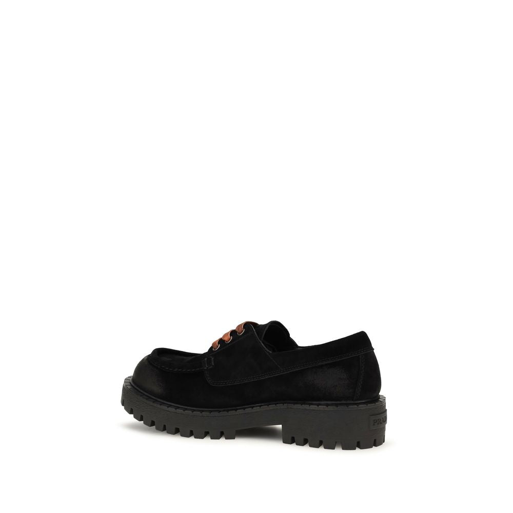 Mocassins à enfiler Prada en cuir suédé noir