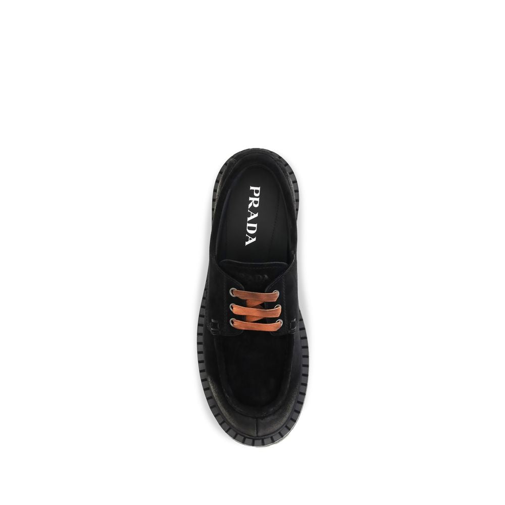 Mocassins à enfiler Prada en cuir suédé noir