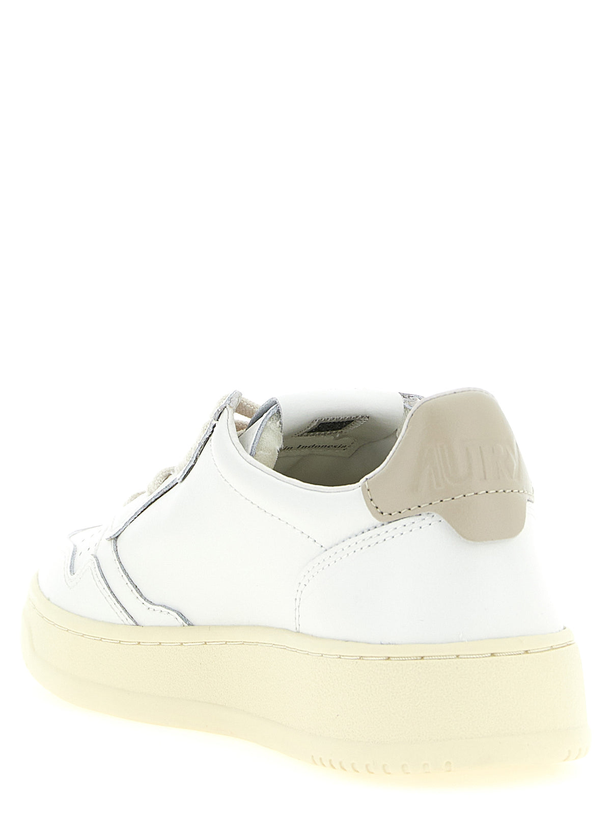 Baskets basses Autry en cuir de vachette beige