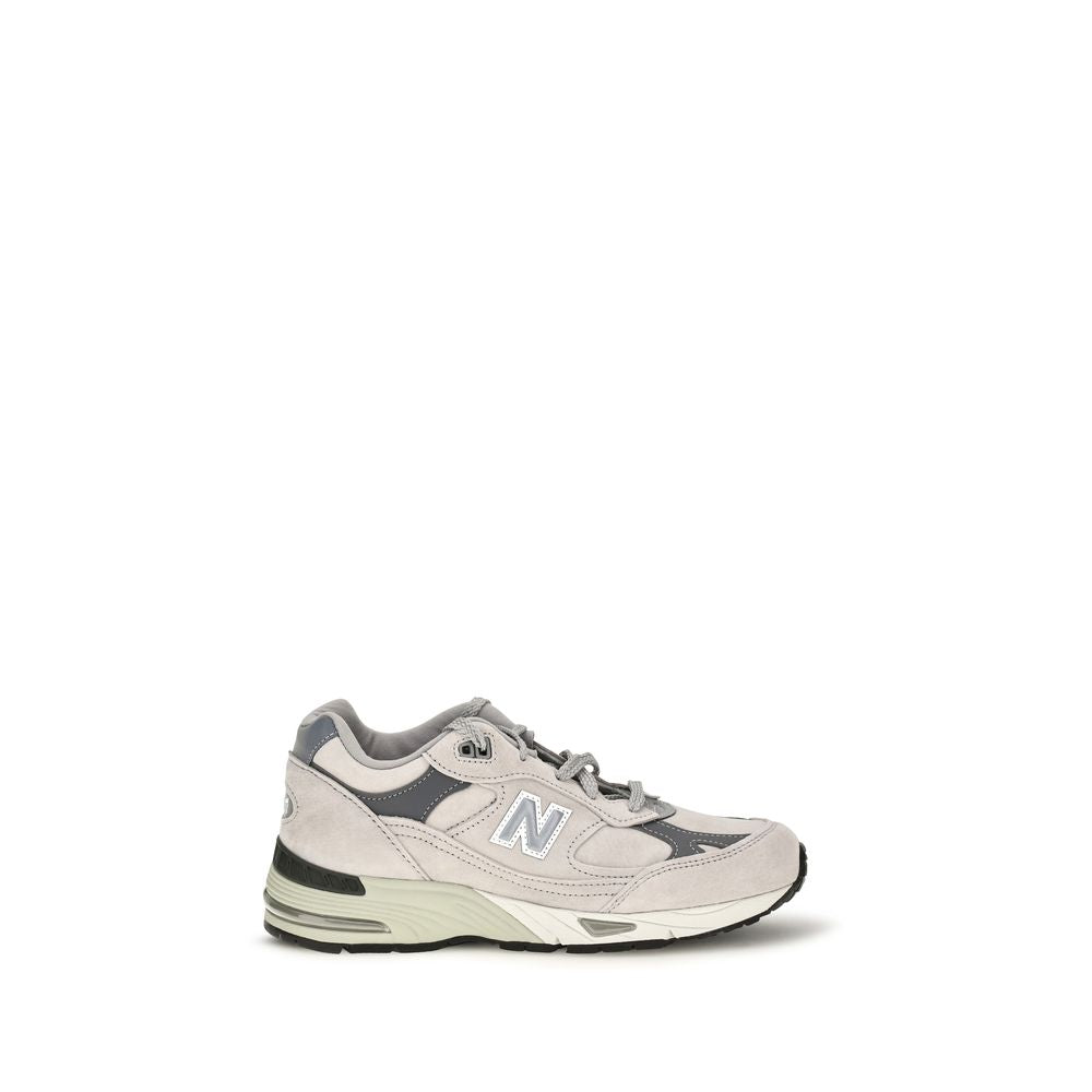 Baskets athlétiques New Balance en cuir suédé gris