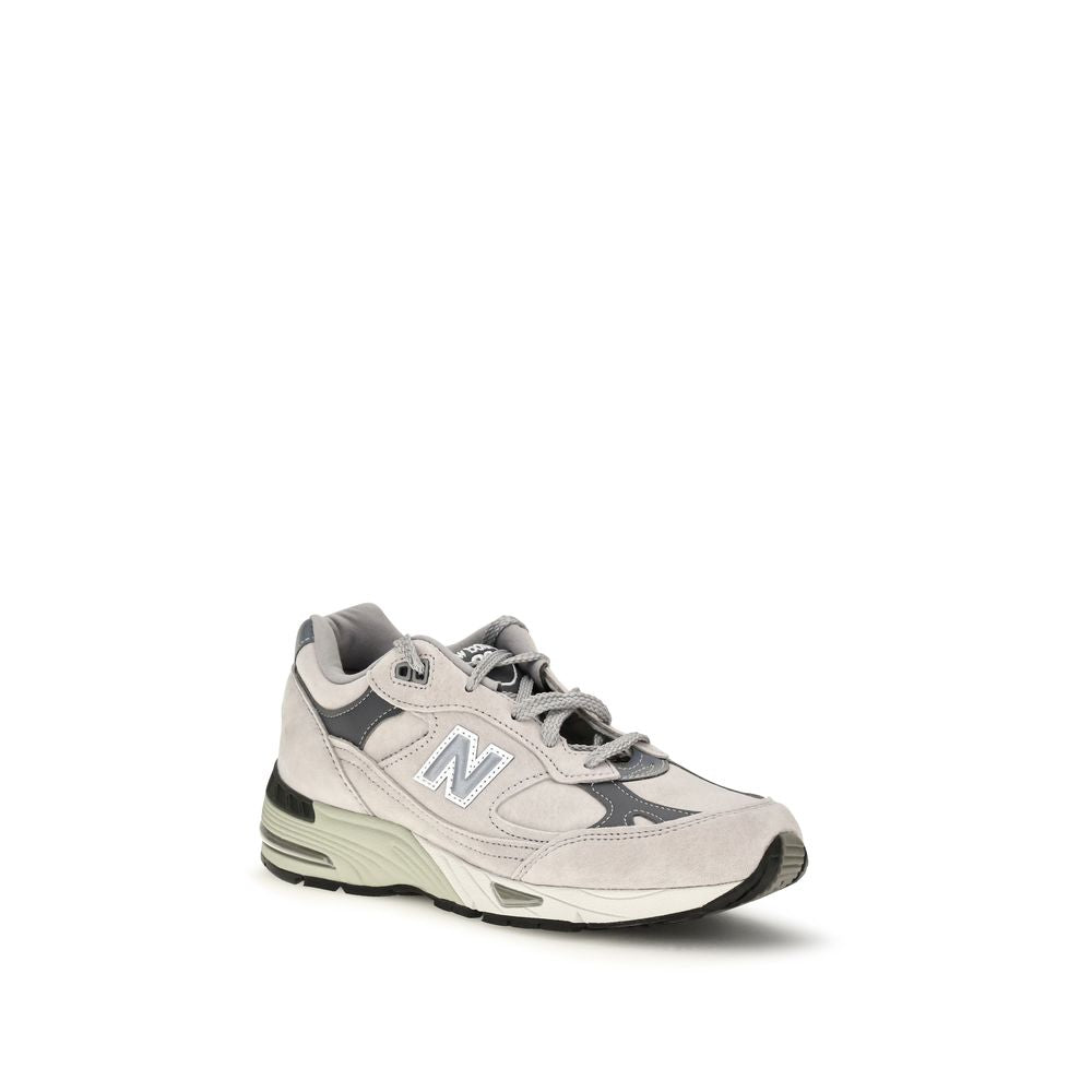 Baskets athlétiques New Balance en cuir suédé gris