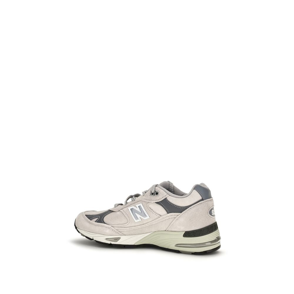 Baskets athlétiques New Balance en cuir suédé gris