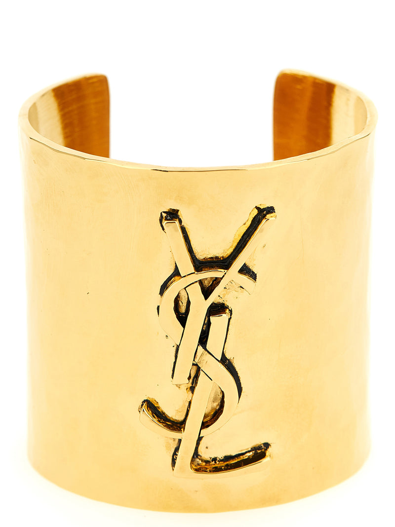 Bracelet en laiton doré Saint Laurent avec logo Cassandre