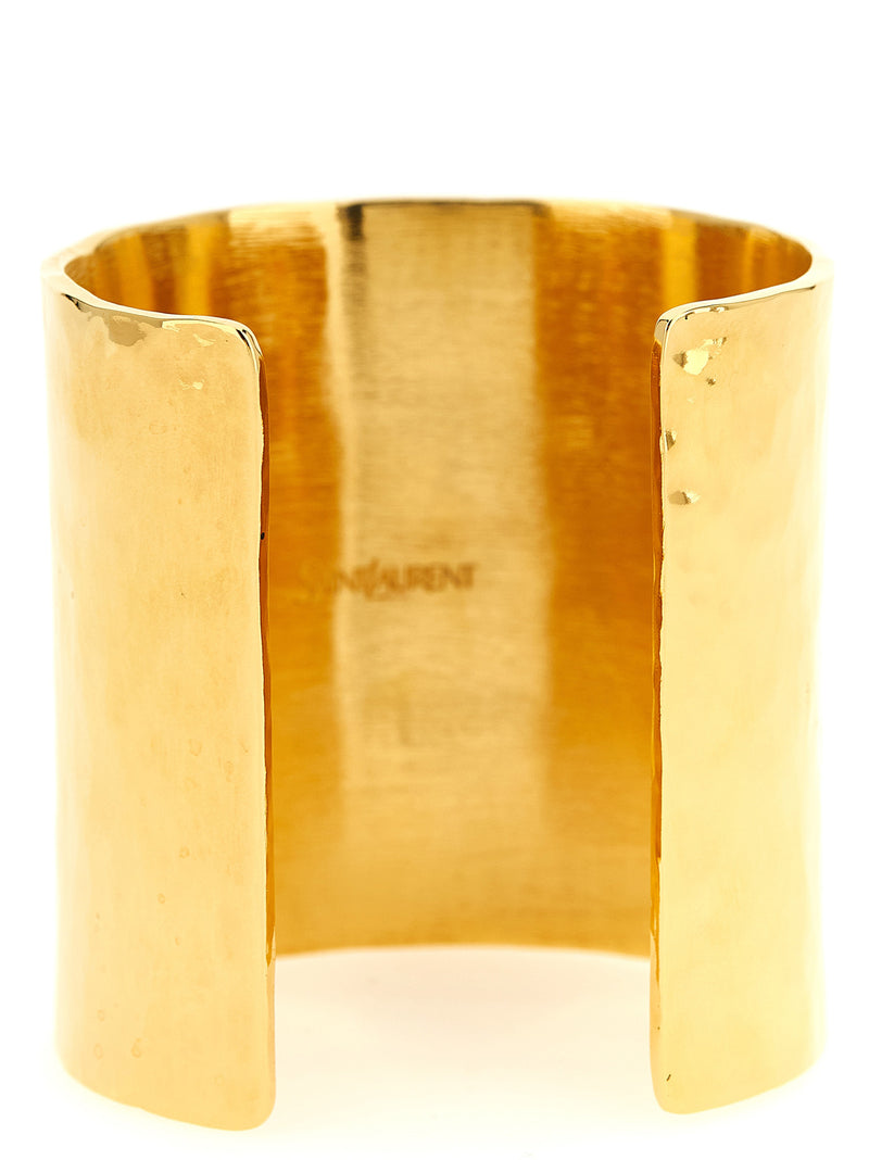 Bracelet en laiton doré Saint Laurent avec logo Cassandre