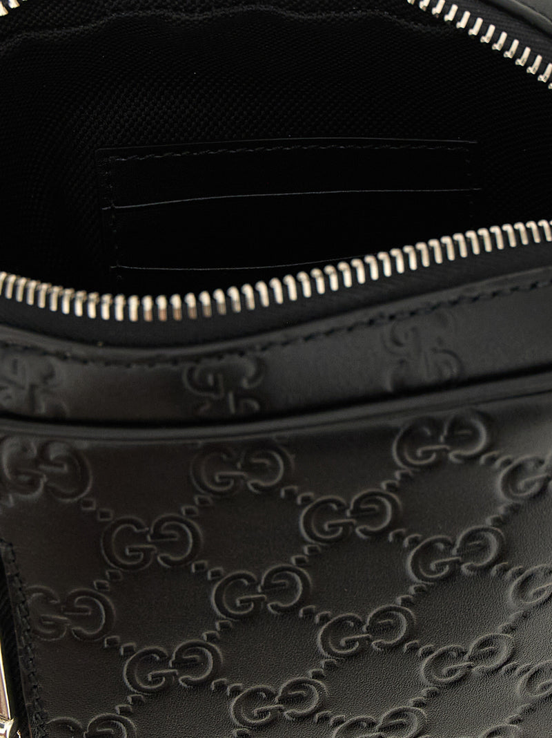 Gucci Black Calfskin Crossbody Bag - GG Emblem Design