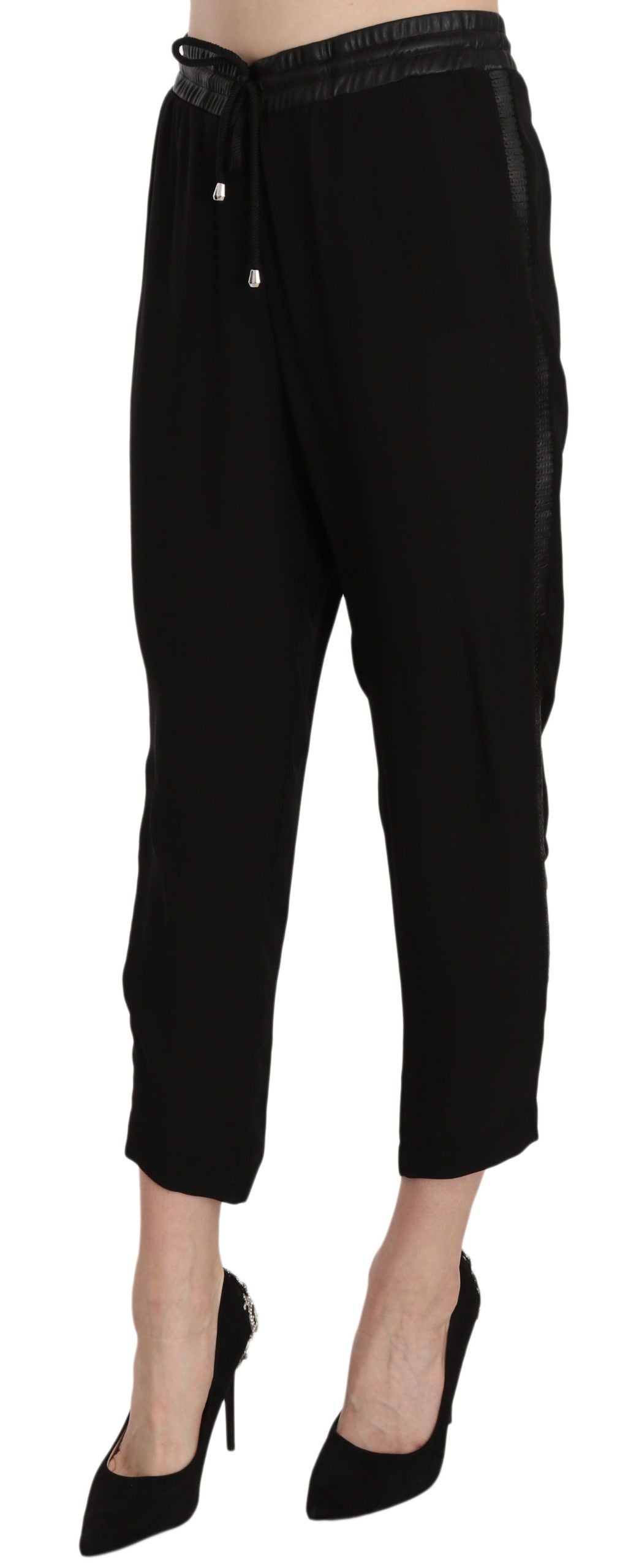 Pantalon Guess noir en polyester, taille haute, coupe courte.
