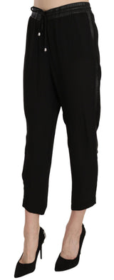 Pantalon Guess noir en polyester, taille haute, coupe courte.