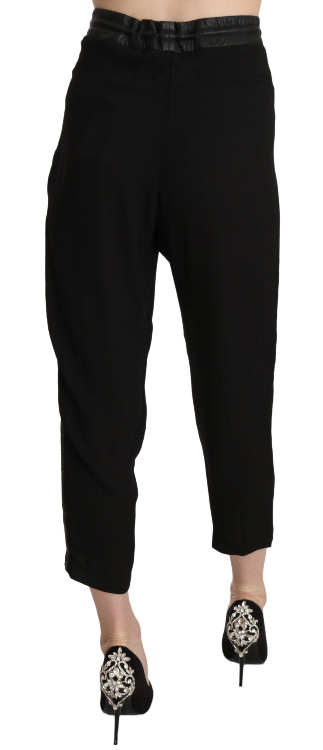Pantalon Guess noir en polyester, taille haute, coupe courte.