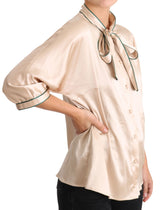 Blouse Dolce &amp; Gabbana en soie extensible avec ruban beige
