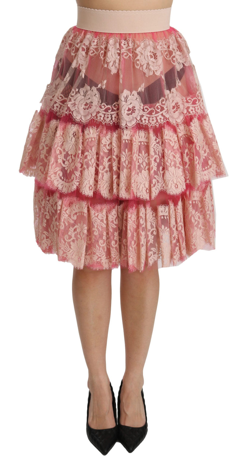 Jupe mi-longue rose en dentelle à plusieurs épaisseurs, taille haute, Dolce &amp; Gabbana.