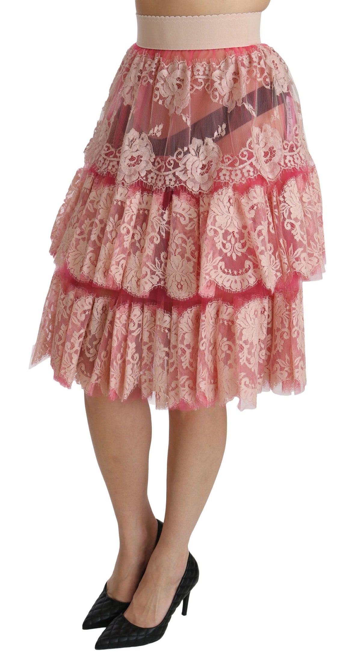 Jupe mi-longue rose en dentelle à plusieurs épaisseurs, taille haute, Dolce &amp; Gabbana.