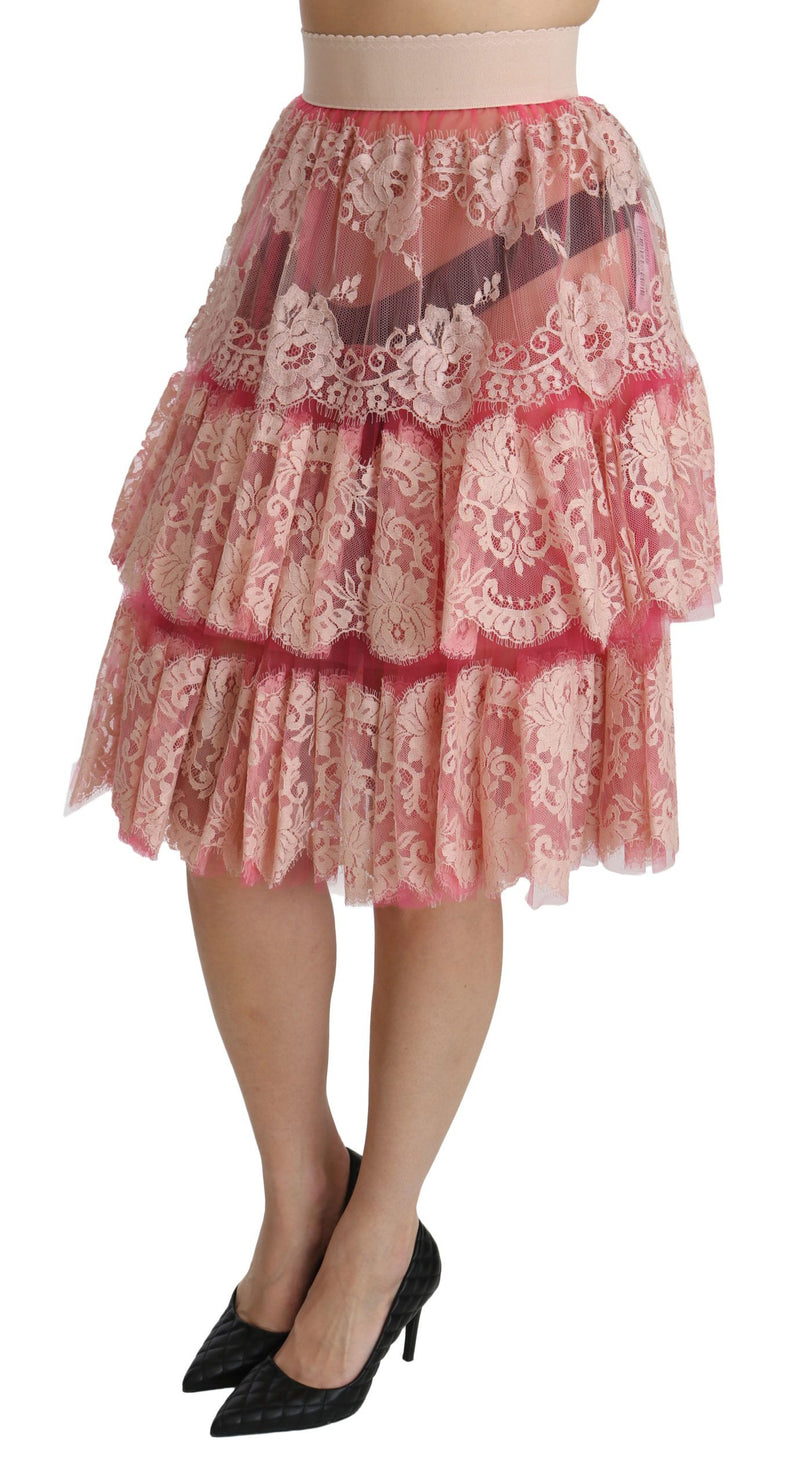 Jupe mi-longue rose en dentelle à plusieurs épaisseurs, taille haute, Dolce &amp; Gabbana.