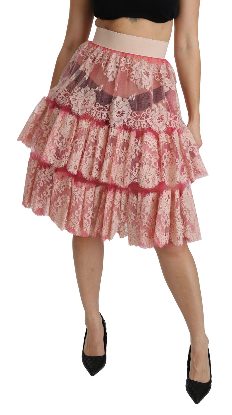 Jupe mi-longue rose en dentelle à plusieurs épaisseurs, taille haute, Dolce &amp; Gabbana.